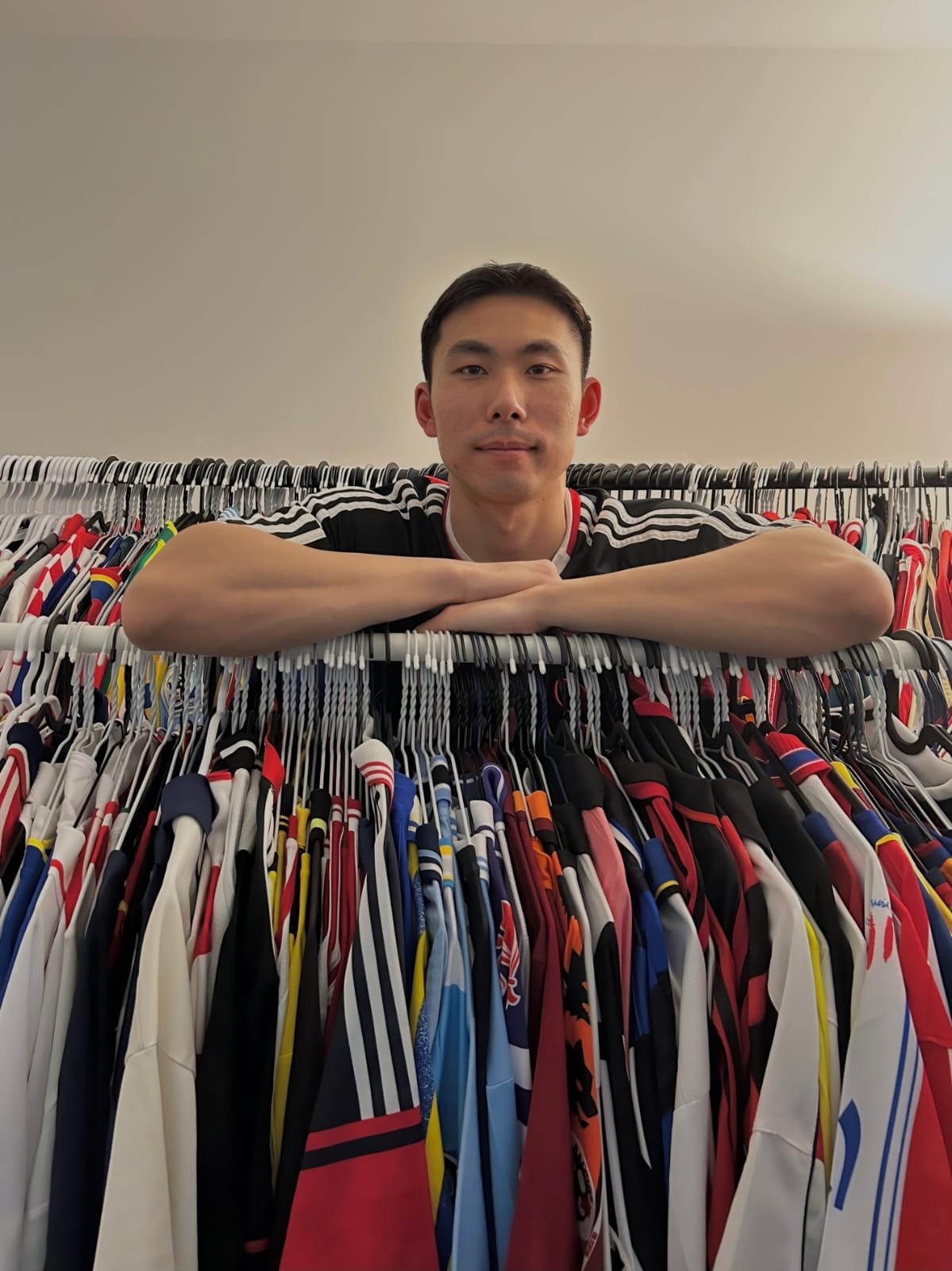 Jin with his vintage football shirt collection